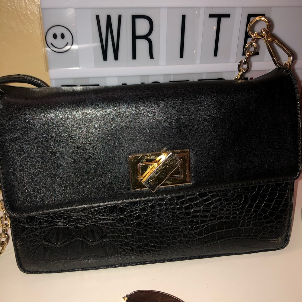 BEBE black leather crossbody with gold chain